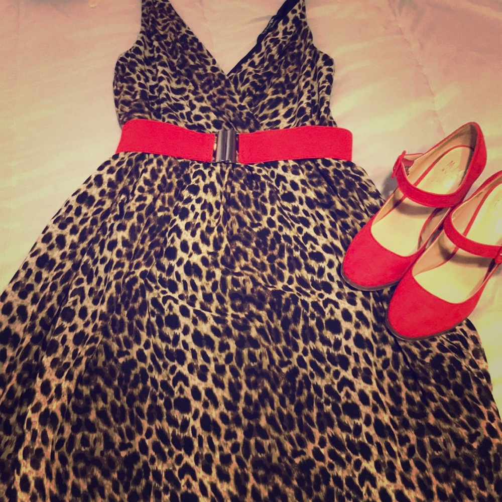 Leopard print dress with red belt